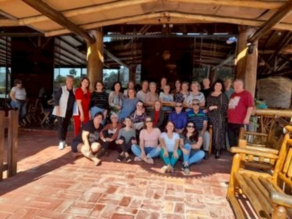 Organizadoras do evento - Grupo de professores e professoras que participaram  do VI Encontro