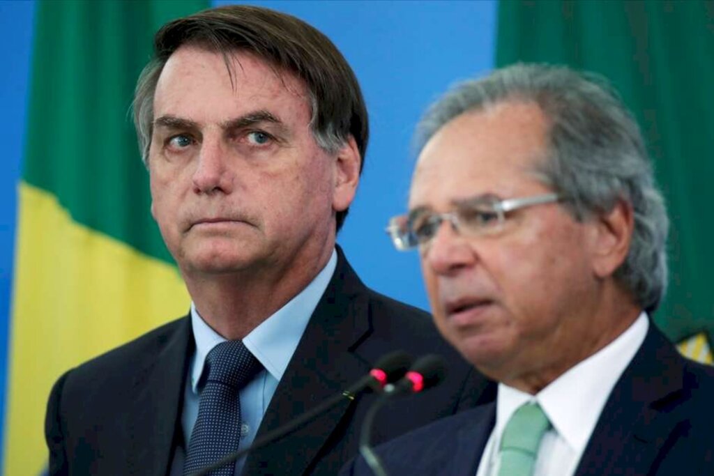 REUTERS/Ueslei Marcelino - Presidente Jair Bolsonaro ao lado do ministro da Economia, Paulo Guedes