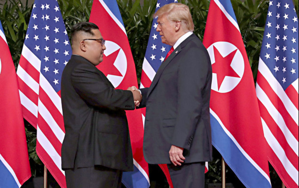 Em encontro histórico,  Kim e Trump assinam acordo que prevê desnuclearização da península Coreana