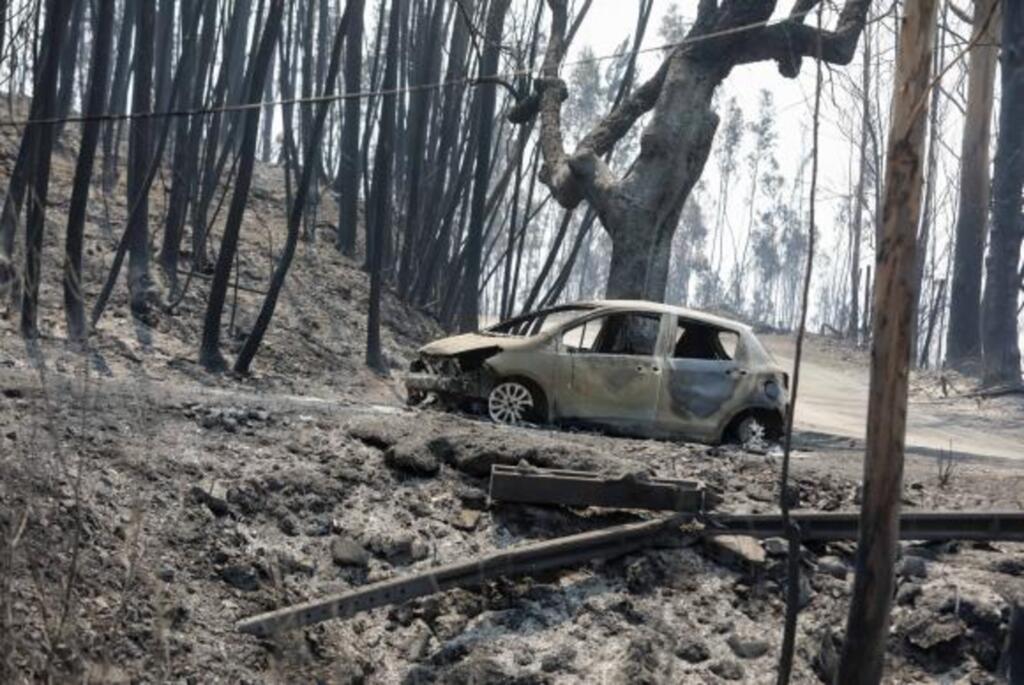 Quase dois mil bombeiros combatem incêndio no centro de Portugal