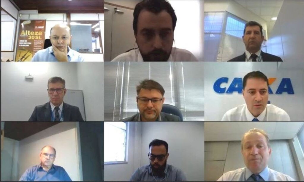 Reprodução - Representantes da Caixa em conversa com empresários